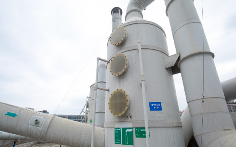 Waste gas purification tower